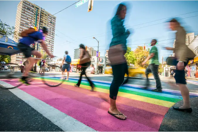 Davie Village — rainbow crosswalk, patios, string lights